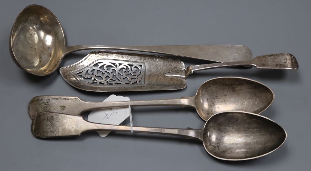 A pair of Victorian silver fiddle pattern basting spoons, London, 1844, A similar silver fish slice & a ladle.